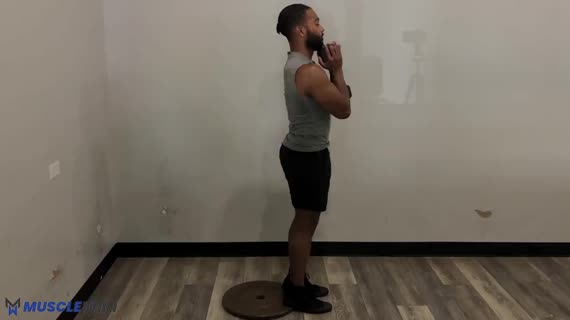 Dumbbell Heels Up Narrow Goblet Squat